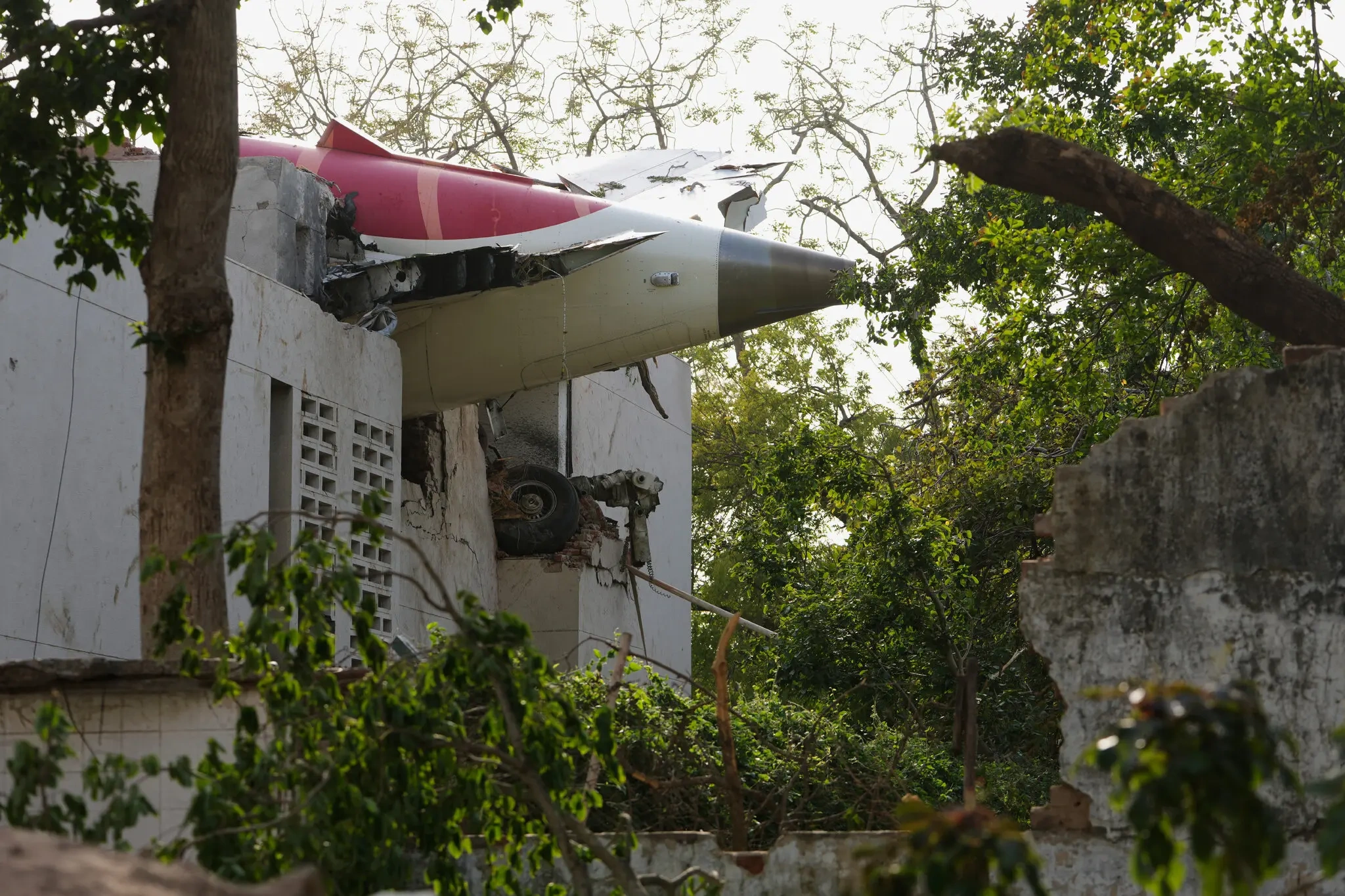 The-tail-section-of-the-Boeing-aircraft-seen-at-the-crash-site-in-Ahmedabad-India-on-Thursday