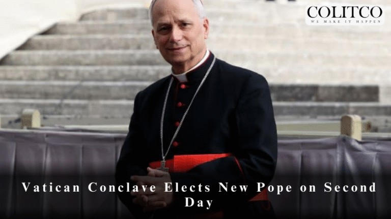 A Catholic cardinal in religious attire stands outdoors, smiling, with stone steps in the background. Text overlay reads: Vatican Conclave Elects New Pope on Second Day.