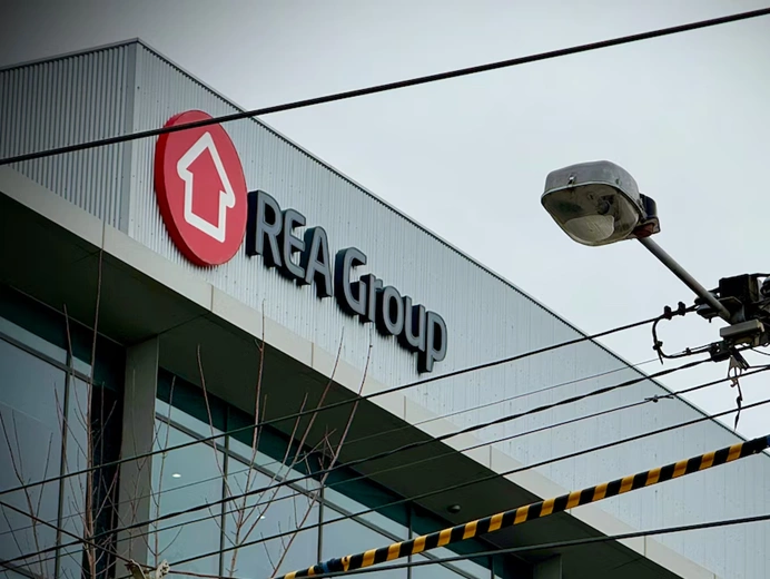 rea group office building exterior displaying company logo