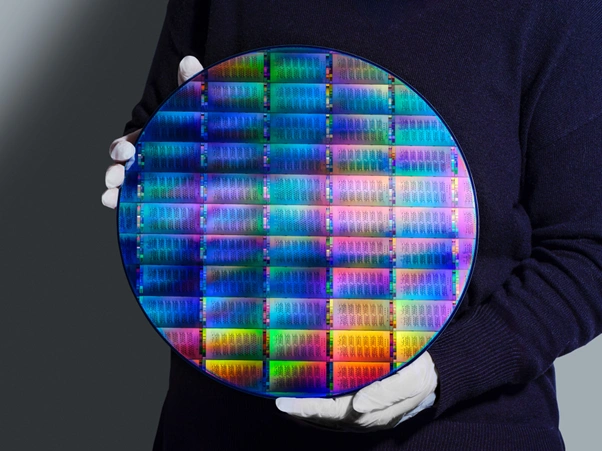 ibm quantum nighthawk wafer researcher holding