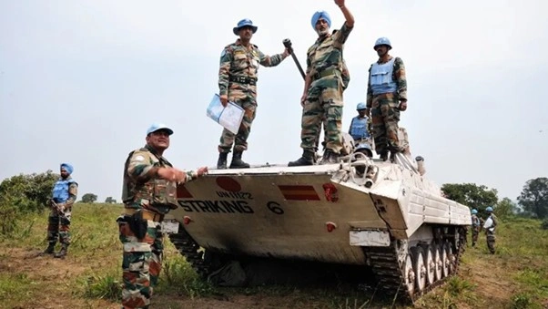 armed security personnel or military patrol near a mining area