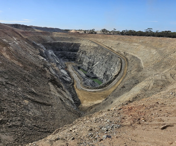 landscape view of the jeffreys find gold mine showing open pit mining terrain and surrounding western australian environment