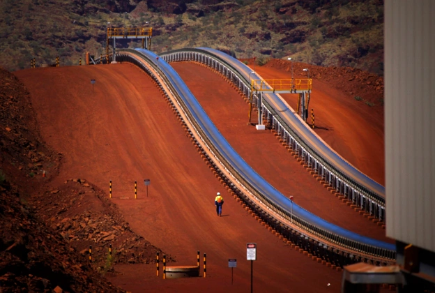 Fortescue mining operations in Western Australia showcasing large-scale iron ore extraction, processing facilities, and mining infrastructure.